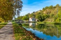 A lock house on the canal of the Garonne River in autumn near Moissac, France