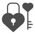 Lock and key in heart shape solid icon. Love padlock and key vector illustration isolated on white. Valentine lock glyph