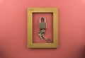 Lock and key isolated by pink colour background. soft focus Royalty Free Stock Photo