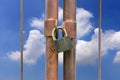 Lock key on rusty fence Royalty Free Stock Photo