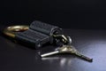 Lock with keys on a black background. Metal padlock close-up Royalty Free Stock Photo