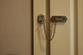 lock latch with chain on the door close-up Royalty Free Stock Photo