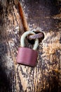 Lock and old latch on wooden door close-up Royalty Free Stock Photo