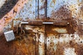 Lock on rusty iron door Royalty Free Stock Photo