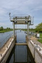 Detailed view of a river lock system used by canal and narrowboats. Royalty Free Stock Photo