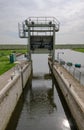 Detailed view of a river lock system used by canal and narrowboats. Royalty Free Stock Photo