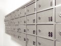 Lockable numbered mailboxes in an apartment building