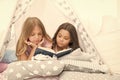 Lockdown ideas for kids. Keep studying at home. Favorite fairy tale. Book about love. Girls children lay bed read book