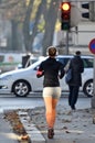 A young woman runs during the lockdown in the city of Wels, Austria Royalty Free Stock Photo