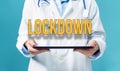 Lockdown theme with a doctor using a tablet pc