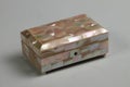 Locked antique jewelry or ornaments box made of handcrafted with mother-of-pearl pieces.