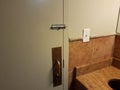 Locked bathroom or restroom door with metal handle Royalty Free Stock Photo