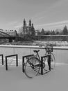 Locked bicycle close by the Jordan bridge and the Piotr and Pawel cathedral in Poznan, Poland.