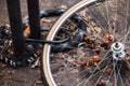 Locked bicycle wheel at bike parking Royalty Free Stock Photo