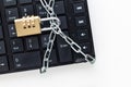 Locked chain on computer keyboard. Royalty Free Stock Photo