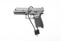 Locked disarmed secured handgun white background