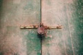 Locked door. Closed old rusty padlock on a distressed wooden door Royalty Free Stock Photo