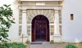 Locked gate archway to church with white columns. Royalty Free Stock Photo