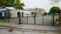 Locked gate to childrens school Royalty Free Stock Photo