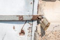 Locked golden padlock lock old rusty metal door close up Royalty Free Stock Photo