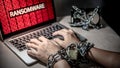 Locked hands and ransomware cyber attack on laptop Royalty Free Stock Photo