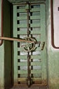 Locked from inside rusty hermetical door of old abandoned Soviet Royalty Free Stock Photo