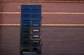 A locked iron door is installed in a red brick wall Royalty Free Stock Photo