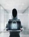 Locked laptop and hacker Royalty Free Stock Photo