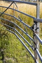 Locked metal framed farm gate