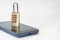 Locked mobile phone with padlock on the left side of the image Royalty Free Stock Photo