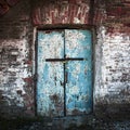 Locked old and mottled iron door Royalty Free Stock Photo