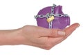 Locked piggy-bank in a hand Royalty Free Stock Photo