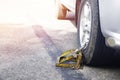 Locked wheel of car.Car wheel lock for parking in a place not allowed by the police.