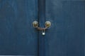 Locked wooden black blue paint door