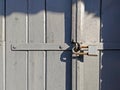 Locked wooden door and lock Royalty Free Stock Photo