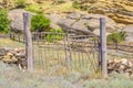 Locked wooden gate made of twigs Royalty Free Stock Photo