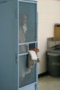 a locker with a person in it that has a towel Royalty Free Stock Photo