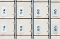 Lockers with electronic locks and fingerprint scanners in modern bright gym