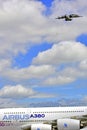 Lockheed c-130Hercules landing over A380 Royalty Free Stock Photo