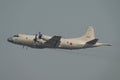 Lockheed P-3 Orion in gray sky