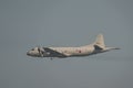 Lockheed P-3 Orion in gray sky