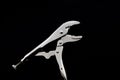 Locking Pliers on Black Background Royalty Free Stock Photo