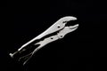 Locking Pliers on Black Background Royalty Free Stock Photo