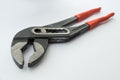 Locking pliers with rubber handles