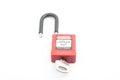 Lockout Padlock red color with key on isolated background Royalty Free Stock Photo