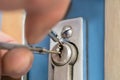 Lockpicker Fixing Door Handle At Home Royalty Free Stock Photo