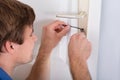 Lockpicker Fixing Door Handle At Home