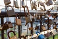 Locks of lovers on a chain link fence. Royalty Free Stock Photo