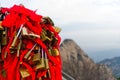 Locks with red bows on mountain Huashan in China Royalty Free Stock Photo