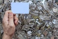 Locksmith holds a spare white key card over to the customer after the customer wishes to bring the key card to create a Royalty Free Stock Photo